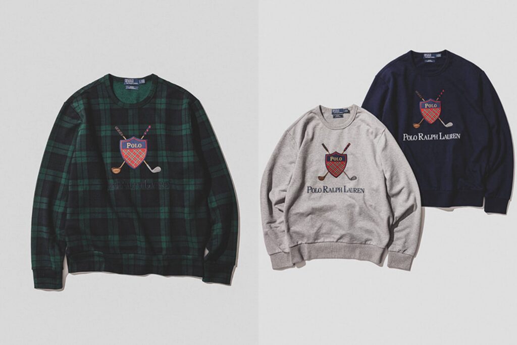 Product lineup from the BEAMS × Polo Ralph Lauren Golf Crest Logo Collection, showing three crewneck sweatshirts in Black Watch tartan, Andover Heather grey, and Newport Navy. Each piece features the revived 1980s Polo Golf crest with crossed clubs embroidered on the chest, highlighting the capsule’s fusion of classic heritage and Japanese craftsmanship.