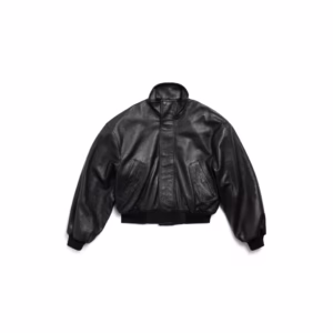 Balenciaga Garde-Robe Blouson in black semi-shiny grainy leather, women’s cropped jacket with structured shoulders and minimalist tailoring, front view.