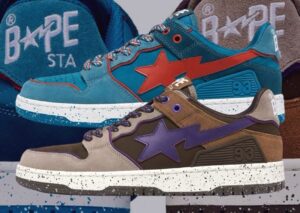 Close-up image of A BATHING APE® SK8 STA “Outdoor Pack” sneakers in blue and brown colorways. The shoes feature premium nubuck and suede uppers, bold STA star logos in red and purple, and speckled midsoles that echo vintage hiking gear aesthetics. The background layers multiple angles of the shoes, highlighting texture, stitching, and the “93” heel branding.