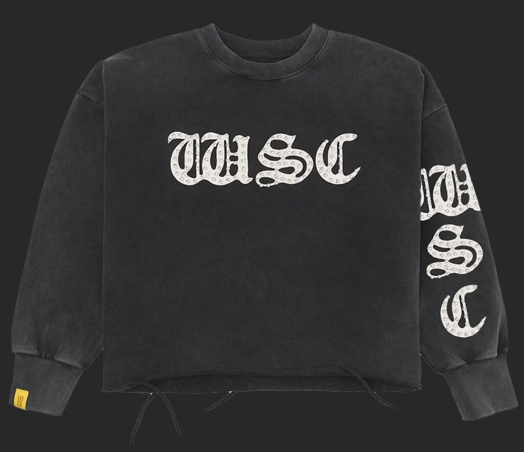 Front view of the When Smoke Clears W.S.C. Crew Sweater in black 14oz French terry, featuring large rhinestone “WSC” lettering across the chest and down the right sleeve, ribbed cuffs, hidden side pockets, and a small yellow WSC tag on the left wrist.