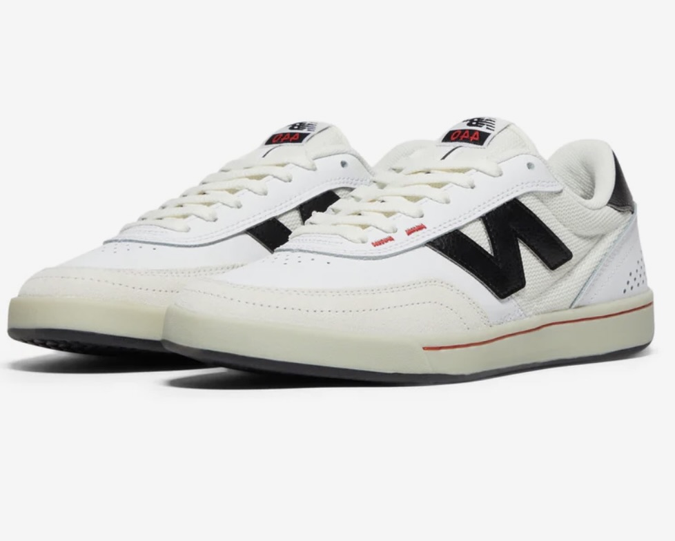 New Balance NM440NO2 White skate shoe, angled front view showing black ‘N’ logo, leather and mesh upper, and retro-inspired design.