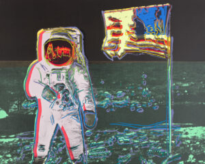 A neon-colored pop art screenprint of an astronaut standing beside an American flag on the Moon, both outlined in vibrant fluorescent tones against a dark, textured background; artwork by Andy Warhol, 1987.