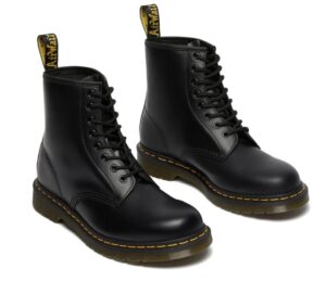 Pair of Dr. Martens 1460 Smooth Leather Lace Up Boots in black with yellow welt stitching, black laces, and signature AirWair heel loop.