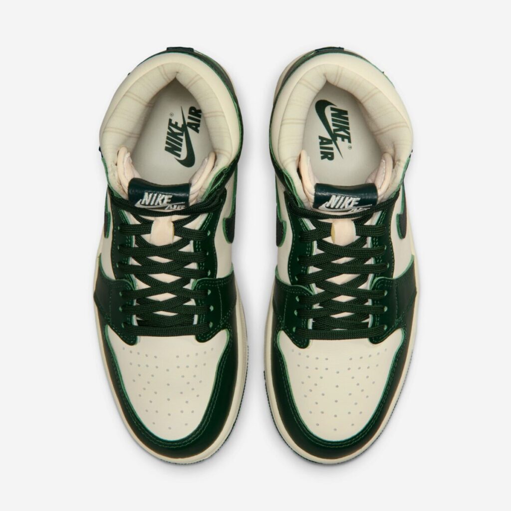 Top-down view of the Air Jordan 1 High OG WMNS “Fir,” showing the symmetrical design with Fir Green leather overlays, Pale Ivory toeboxes, dark green laces, and Nike Air branding printed on the ivory insoles.