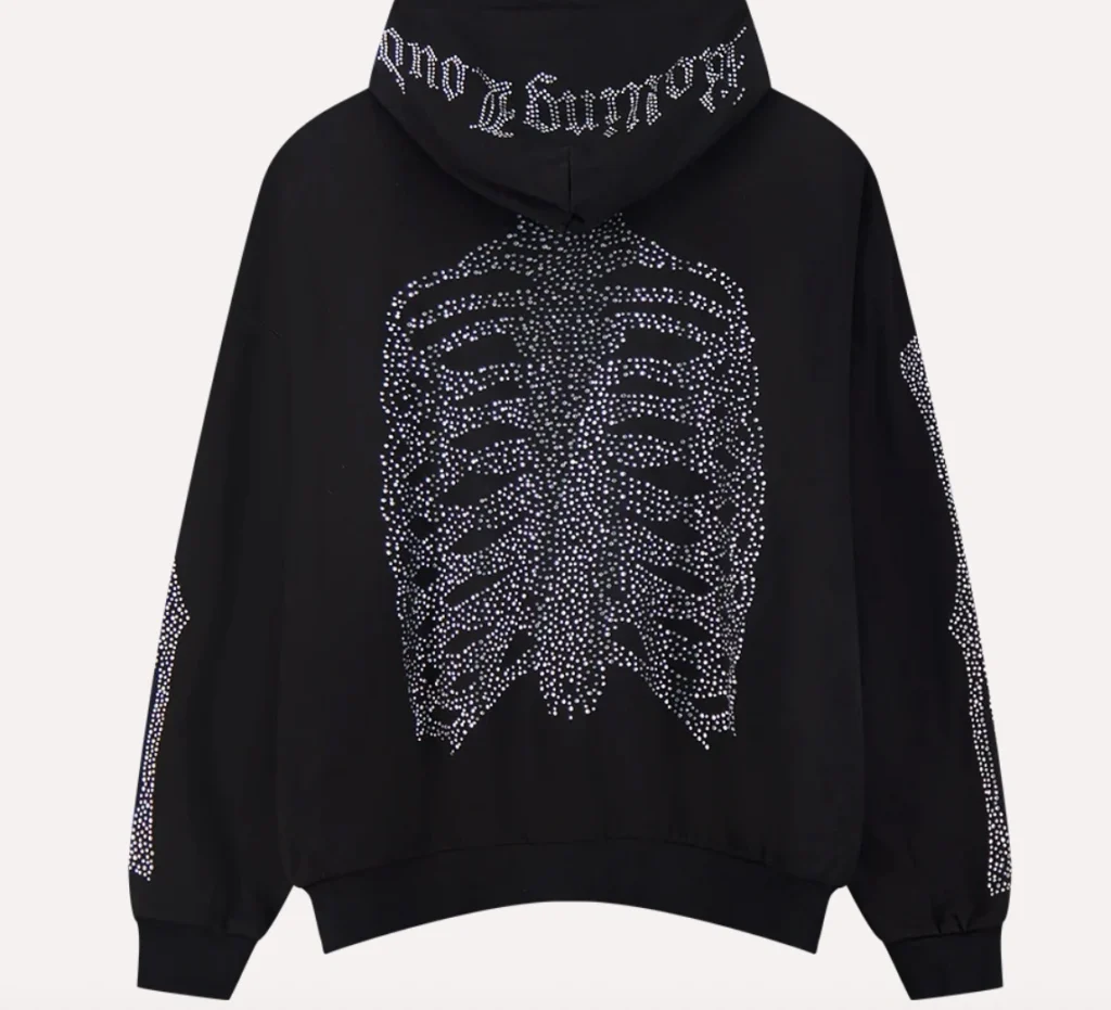 Back view of the Rolling Loud WEATSHIRT RL Bones Zip Up Hoodie featuring a rhinestone skeleton ribcage graphic and gothic “Rolling Loud” lettering across the hood on black fleece fabric.