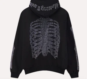 Back view of the Rolling Loud WEATSHIRT RL Bones Zip Up Hoodie featuring a rhinestone skeleton ribcage graphic and gothic “Rolling Loud” lettering across the hood on black fleece fabric.