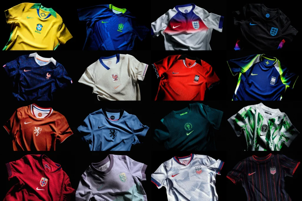 Collection of Nike national team football jerseys for the 2026 FIFA World Cup displayed on a dark background, featuring designs for countries including Brazil, France, England, South Korea, the Netherlands, Nigeria, and the United States, highlighting diverse colors, patterns, and the signature Nike Swoosh on each kit.