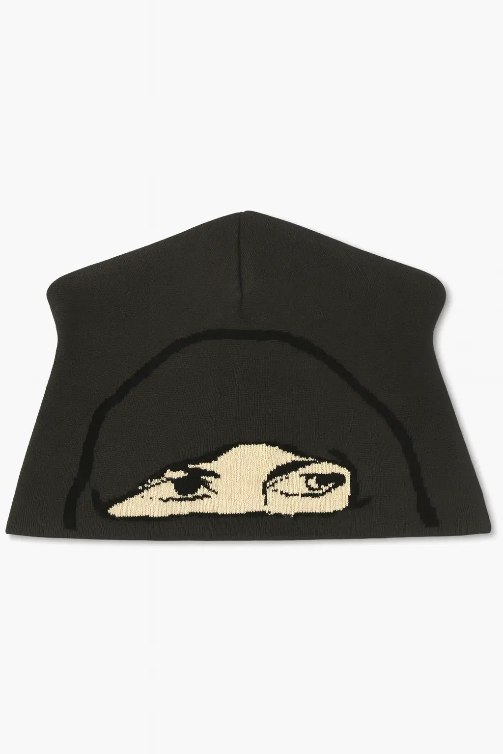 Black knit skully beanie displayed on a white background, featuring a beige woven graphic of a hooded figure’s eyes across the front