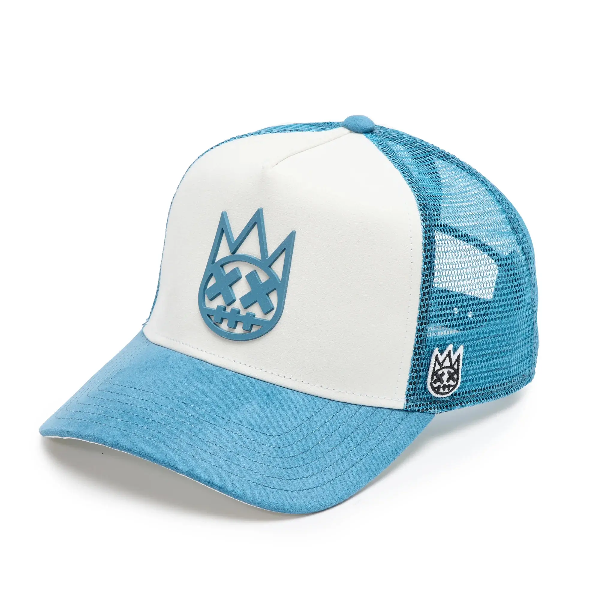 : Angled side view of Cult of Individuality “Shimuchan” Logo Mesh Trucker Hat in winter white with blue suede brim and mesh panel.