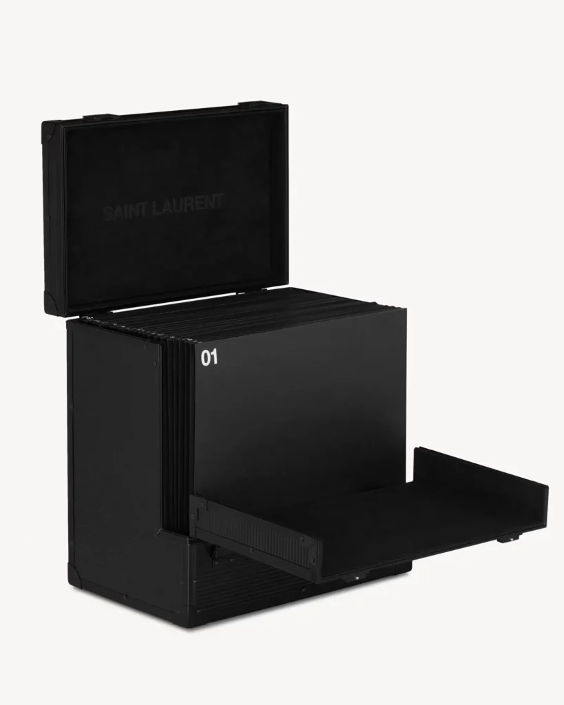 Open Saint Laurent Rive Droite vinyl advent calendar case showing the first numbered black record drawer sliding outward