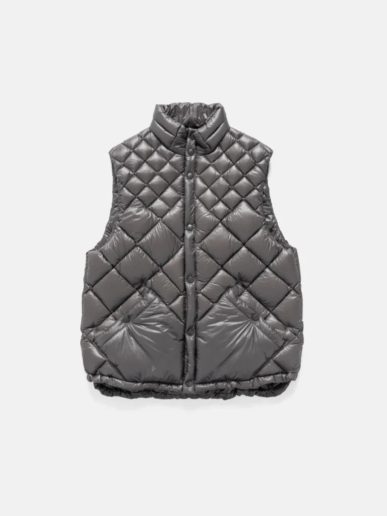 Front view of the HAVEN × NANGA Skyline Vest in grey, featuring diamond-quilted construction, snap closure, and high padded collar