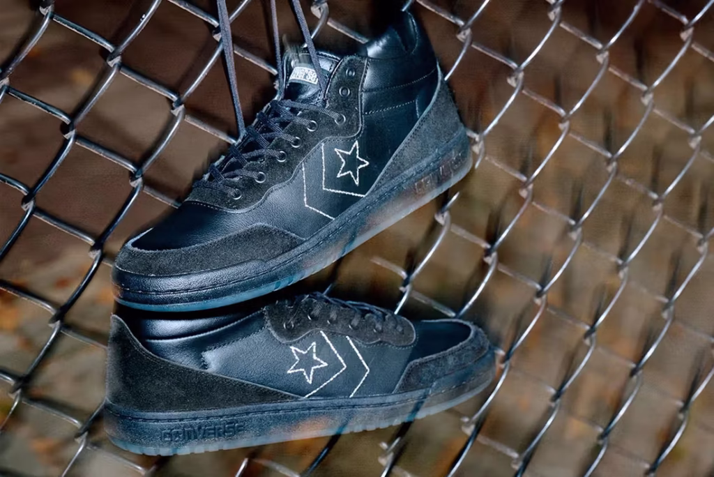 Sage Elsesser wearing his Converse CONS Fastbreak Pro sneakers, captured in a composed, sunlit street scene that reflects his balance between art, skate, and culture