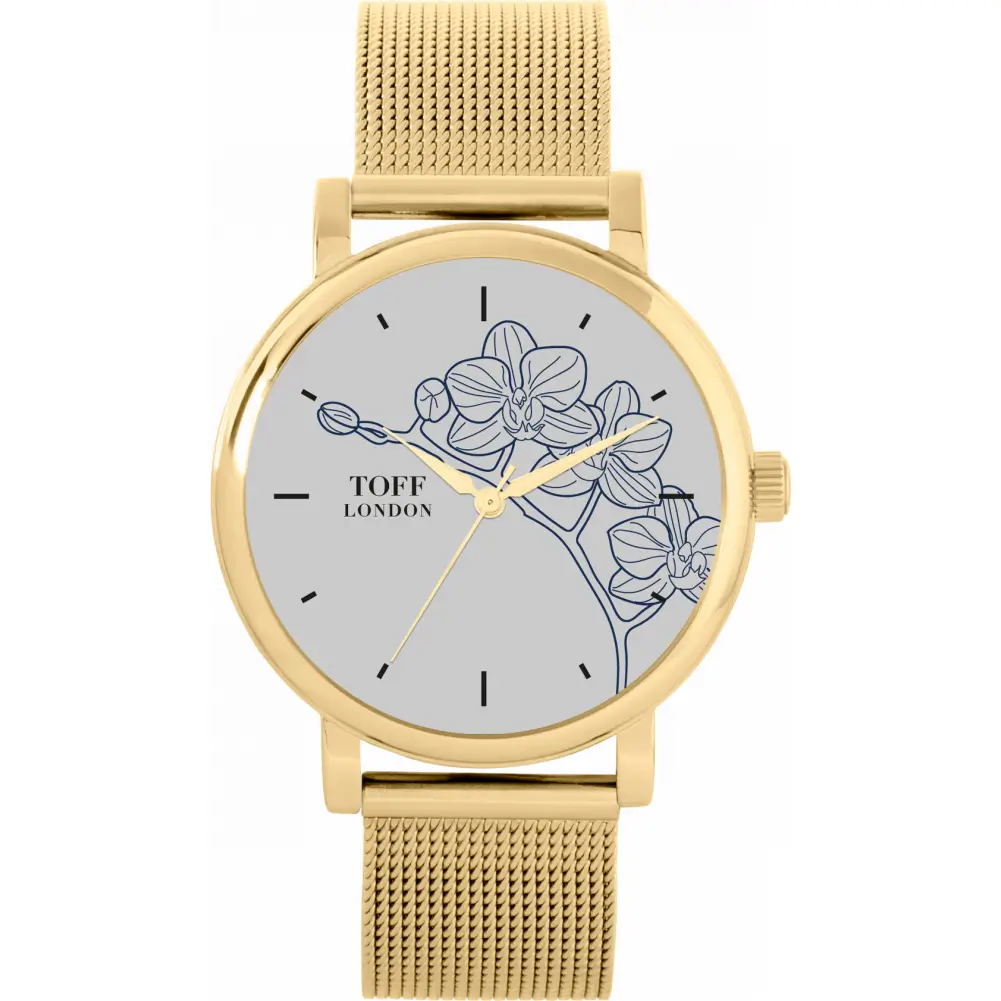 A gold Toff London ladies’ watch featuring a minimalist blue orchid illustration on a pale grey dial, gold hour markers, slim gold hands, and a polished gold mesh strap