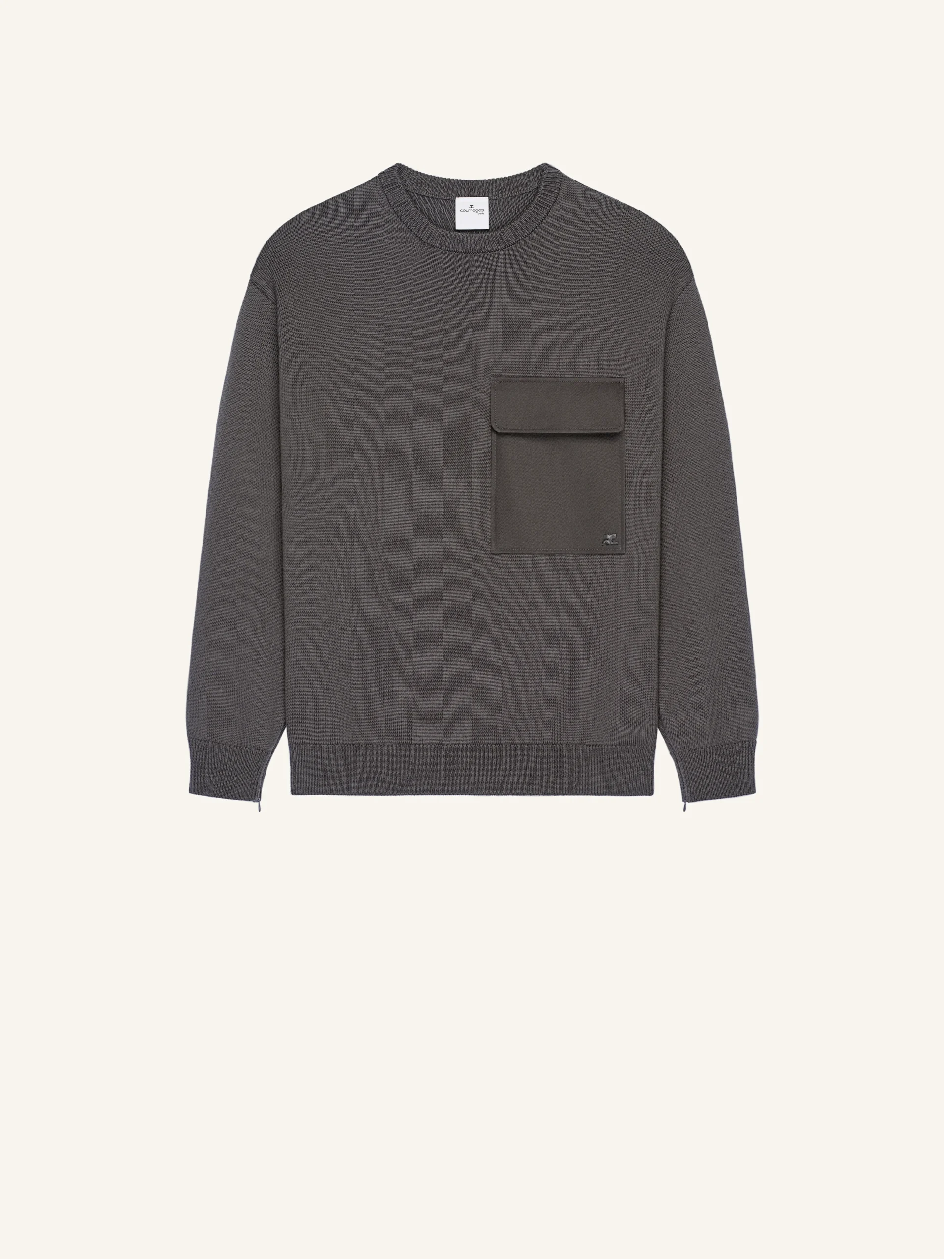 Courrèges Utility Wool Sweater in charcoal grey, shown front-facing on a neutral background, featuring a clean crewneck silhouette, dense wool knit construction, and a functional chest pocket with subtle logo detailing