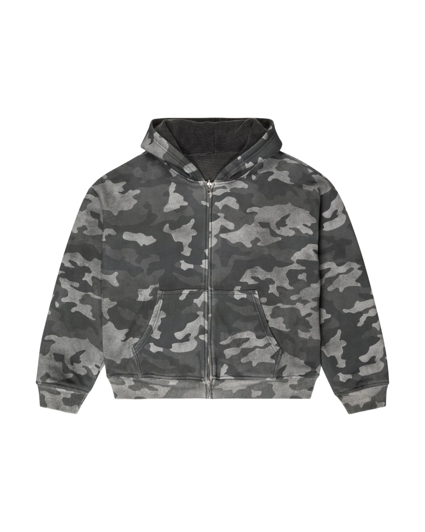 Grey-scale camouflage zip-up hoodie with a full front zipper, kangaroo pocket, and ribbed cuffs and hem, featuring a soft, slightly washed finish and a structured hood