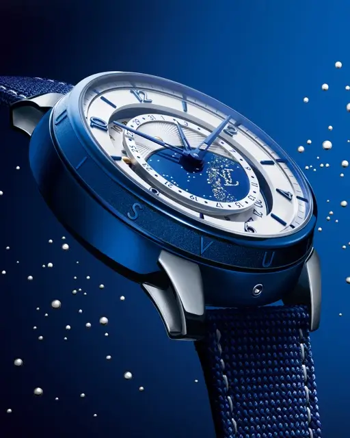 Louis Vuitton × De Bethune LVDB-03 Louis Varius GMT watch in blue titanium with starry sky dial and navy woven strap against deep blue background