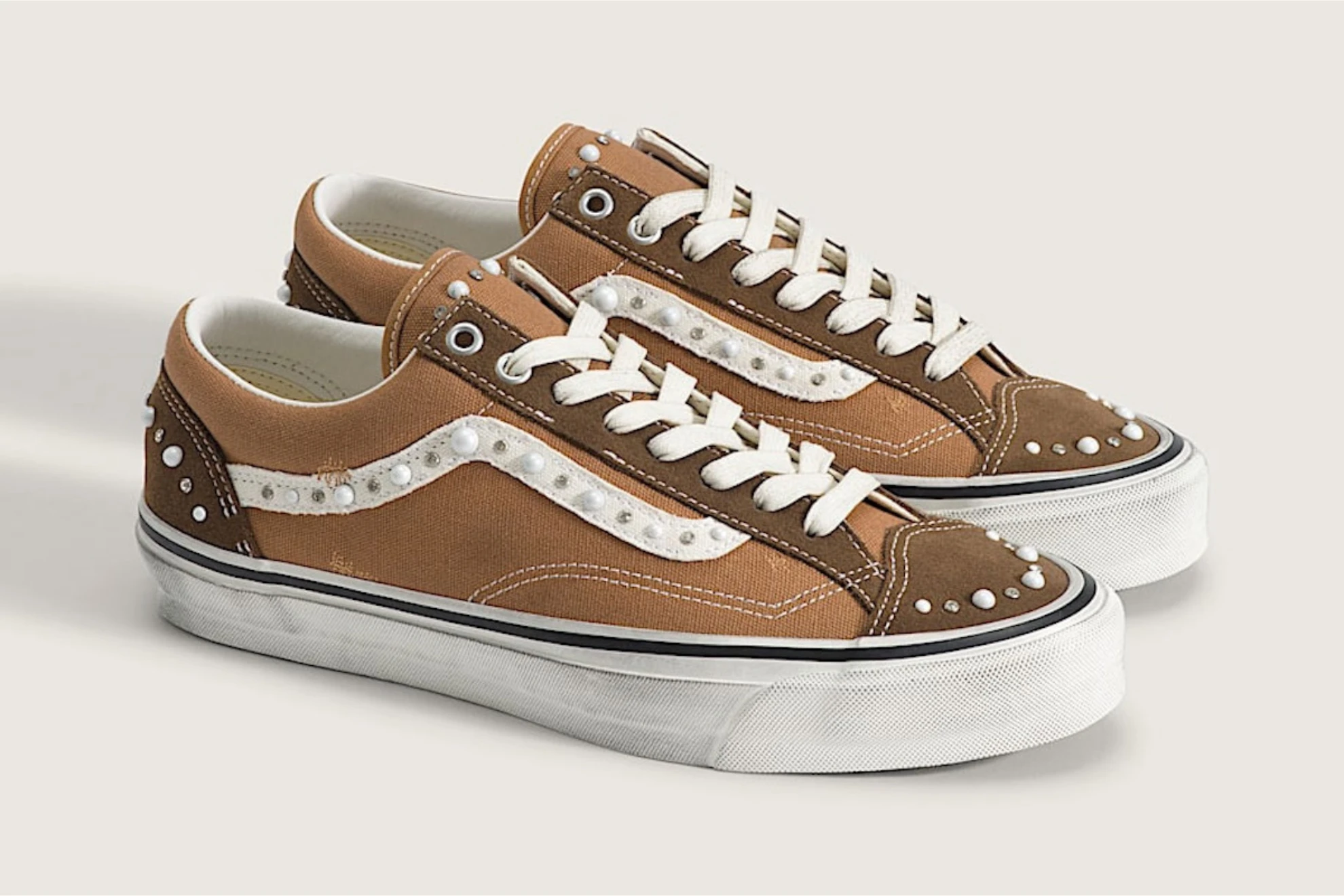 Vans Old Skool Pearlised edition featuring tan canvas upper, suede overlays, and pearl embellishments along the iconic Sidestripe