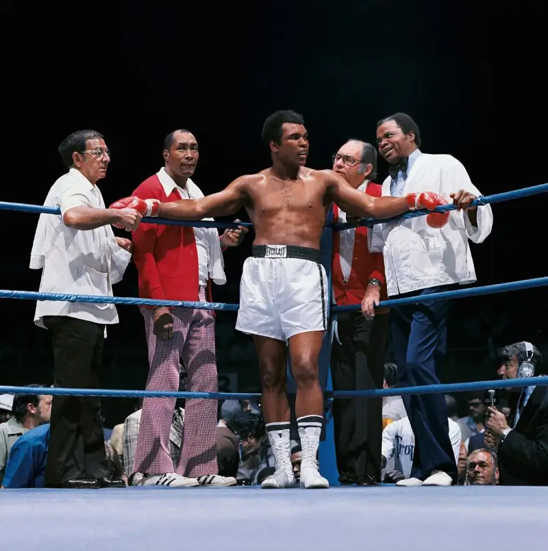 Neil Leifer’s iconic photograph of Muhammad Ali resting in his corner during the 1975 Ali vs. Ron Lyle heavyweight boxing match, featured in TASCHEN’s Homage to Ali collection