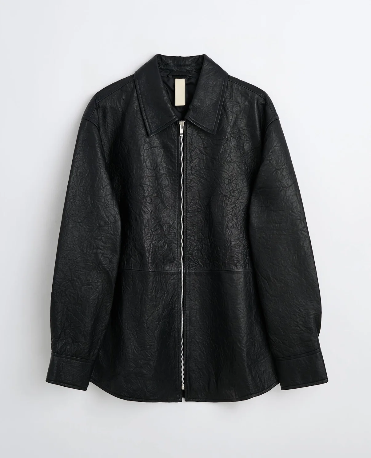 Sunflower Copenhagen black crinkle leather overshirt with minimalist tailoring and wrinkled leather texture