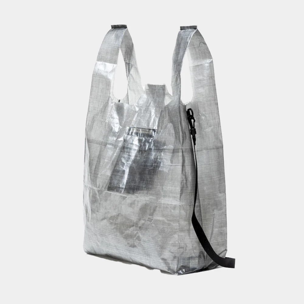 Rear view of the MW-AC25201 Dyneema® market bag in Steel Grey featuring translucent composite fabric, exterior pocket, and detachable black shoulder strap