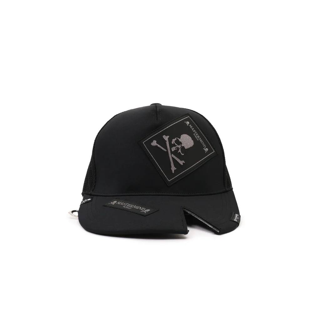 Front view of the black MASTERMIND WORLD Tagged Cap featuring the iconic skull-and-crossbones patch, structured crown, and signature branded detailing