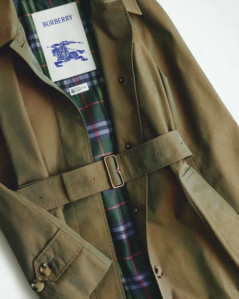 Burberry belted gabardine car coat in holly green from the Queen Elizabeth capsule, featuring a tartan-inspired lining created with the Royal Collection Trust