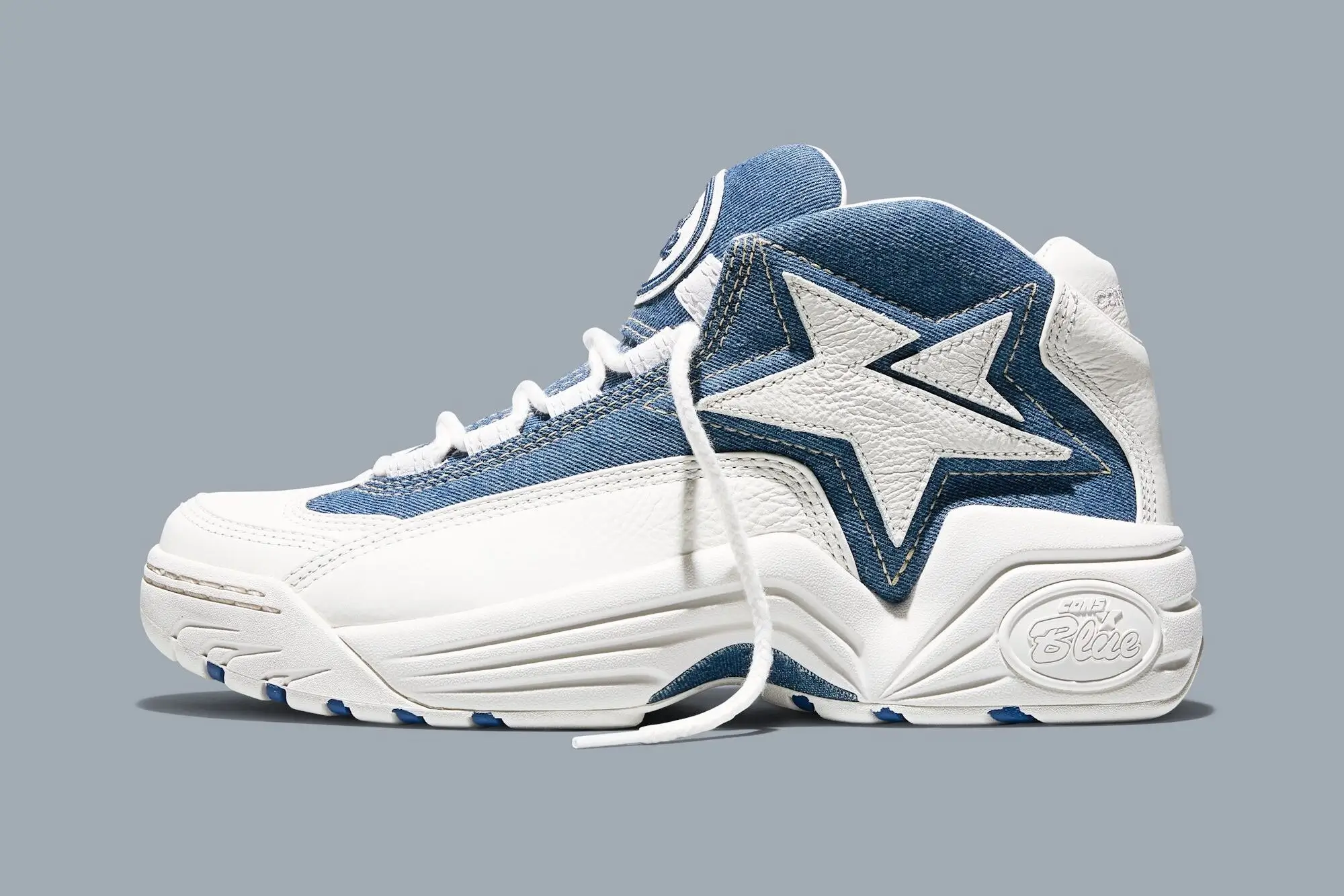 Converse CONS Mid “Kentucky Denim” sneaker in Federal Blue and Vintage White with denim upper panels, white leather overlays, and star-chevron logo shown in lateral side view
