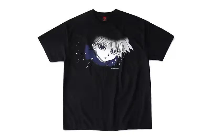 Black GEEKS RULE × Hunter × Hunter Vol. 5 graphic T-shirt featuring a minimalist silkscreen portrait of Killua Zoldyck with glowing blue aura and subtle star-like accents printed on premium black cotton