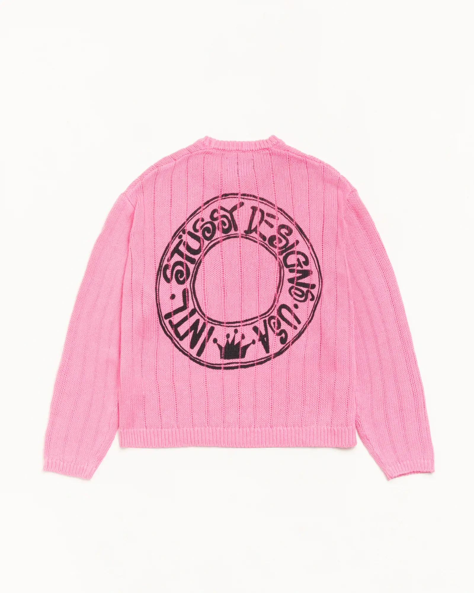 Full back view of a pink BUANA ribbed knit sweater featuring a relaxed silhouette and a large black circular logo printed across the back, with stylized lettering and a crown graphic centered at the bottom of the emblem