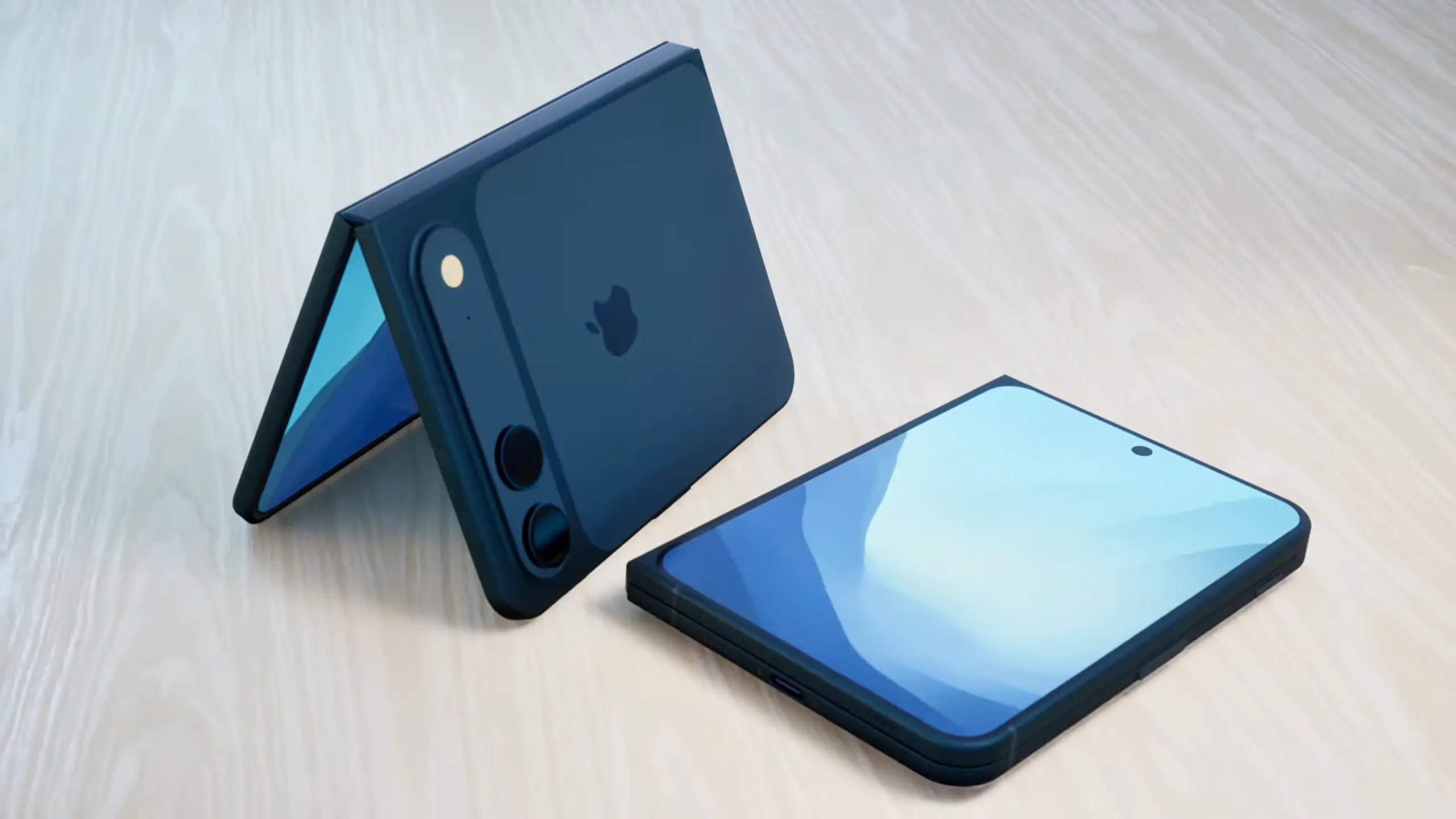 Apple foldable iPhone concept shown partially open in tent position alongside a closed unit, featuring a wide form factor, dual rear cameras, and a tablet-like inner display on a minimalist surface