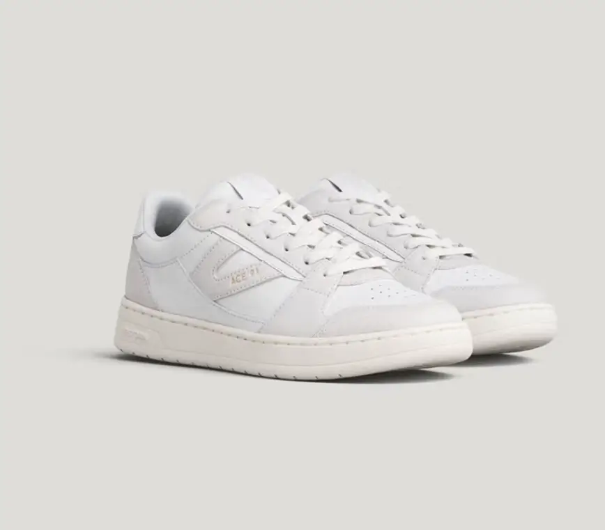 Tretorn Ace ’91 white leather shoe featuring a slim, low-profile silhouette with tonal stitching, perforated toe box, and a clean rubber outsole designed for everyday wear