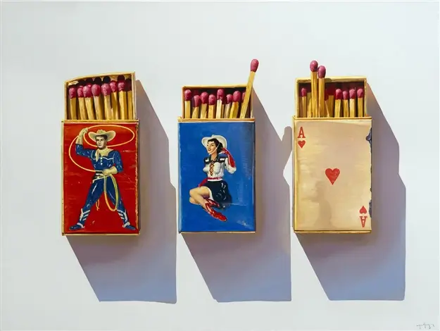 Matchbooks styled like vintage playing cards arranged against a neutral background, each open to reveal red-tipped matches; one features a cowboy figure, another a pin-up style woman, and the third an Ace of Hearts design, casting soft backdrops that emphasize their graphic composition and nostalgic Americana aesthetic