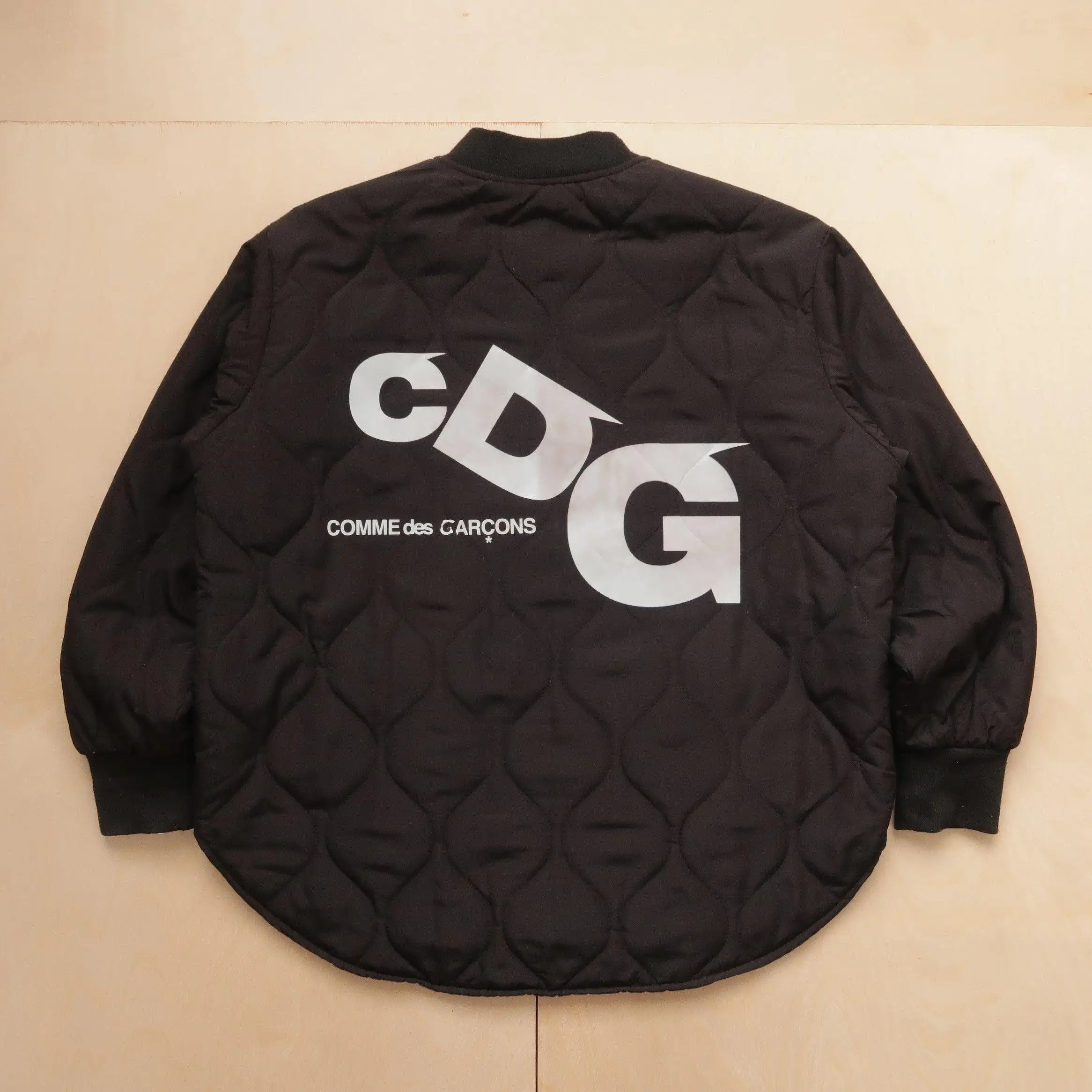 CDG: The Gateway to Rei Kawakubo’s World Through Outerwear and Typography